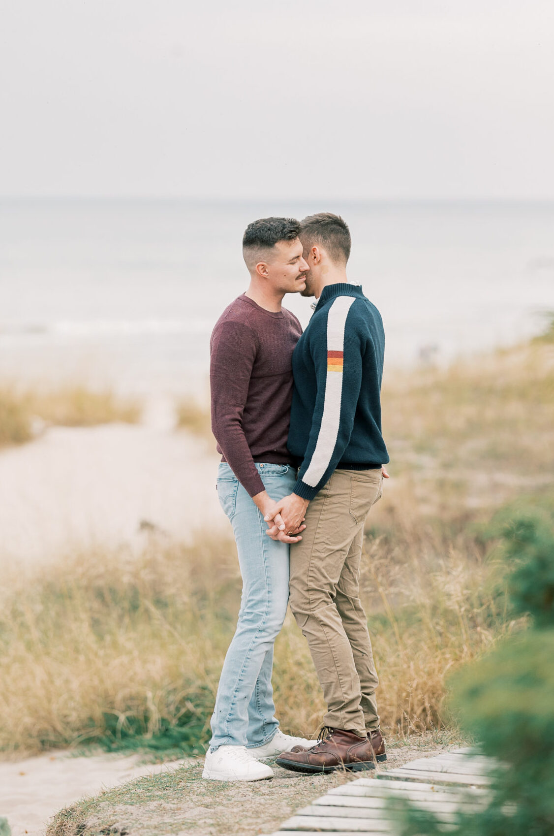Kohler Andrae State Park engagement session featuring couple and their dog