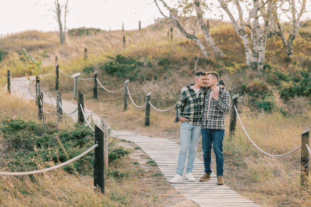 Romantic autumn engagement photos at Kohler Andrae State Park near Milwaukee Wisconsin