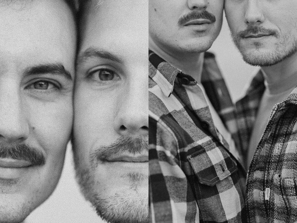 Couple embracing in the sand dunes at Kohler Andrae State Park engagement session