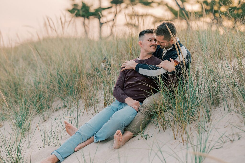 Soft romantic engagement photography in Wisconsin beach dunes